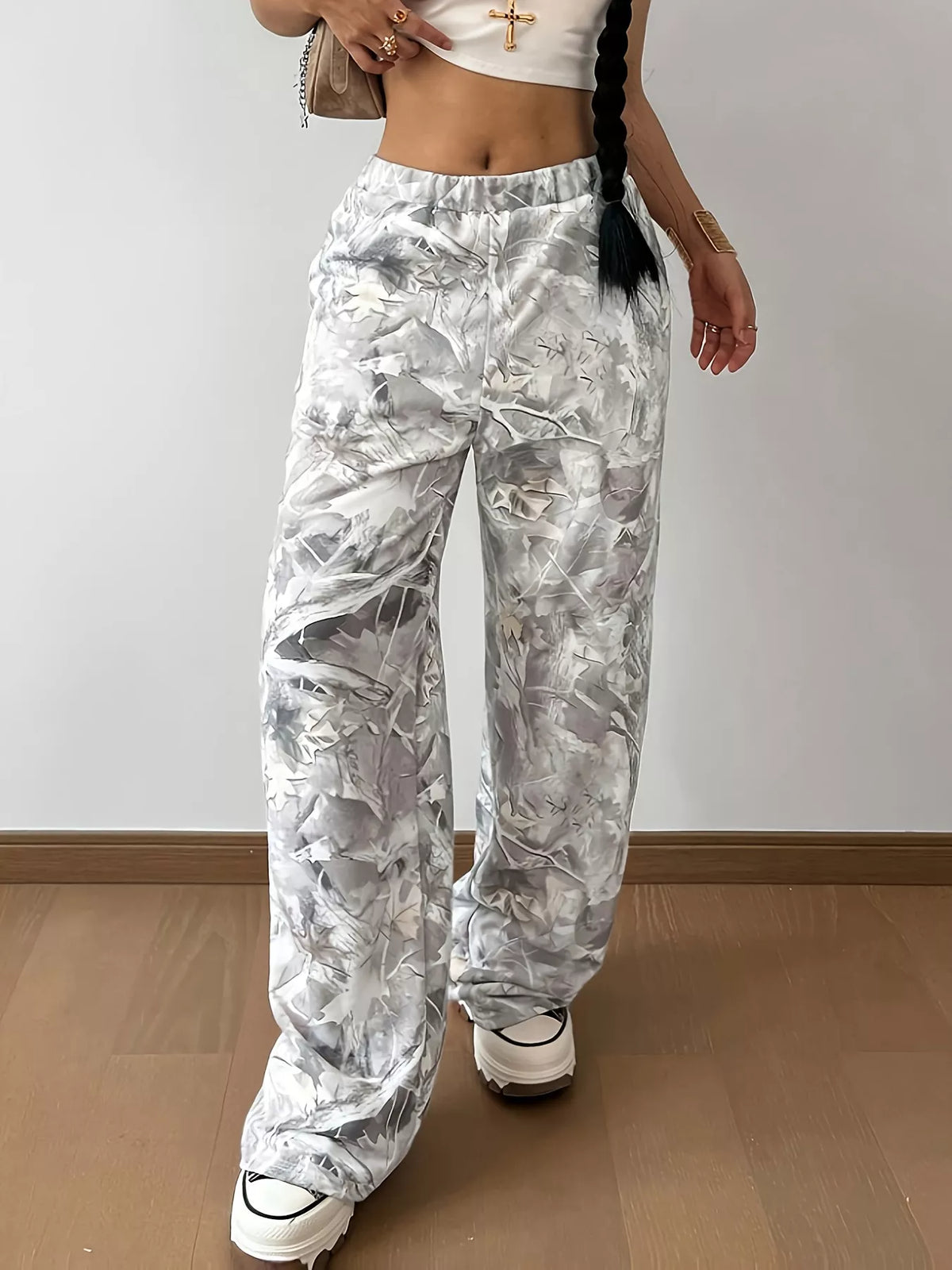 Women's light gray abstract print wide-leg casual pants with elastic waistband, relaxed fit and functional pockets.