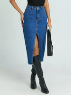 Women's blue high-waisted denim skirt with front slit, raw hem and classic cotton-rich denim finish.