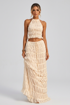 Women's boho halter crop top and maxi skirt set collage featuring five colors, ruffled details, open-back ties and tiered skirt.