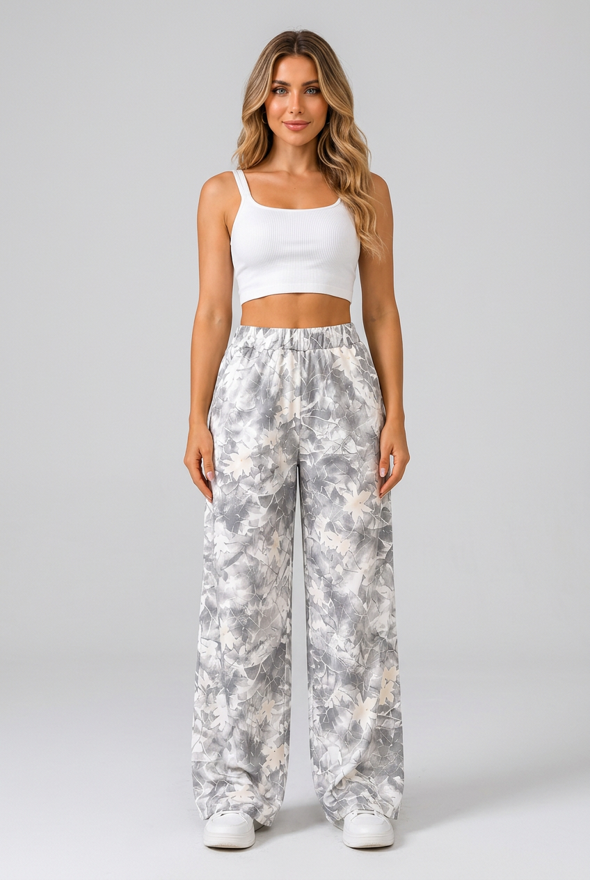 Women's light gray printed wide-leg pants collage highlighting the abstract pattern, elastic waistband, pockets and relaxed silhouette.