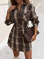 Women's dark brown plaid button-up shirt dress with classic check pattern, front buttons and functional pockets.