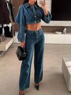 Women's light blue cropped denim jacket and matching wide-leg jeans two-piece set with contrast stitching.